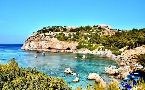 Turquoise water and rocky headland at Anthony Quinn Bay near Faliraki